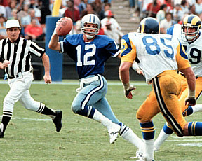 Roger Staubach under pressure from Jack Youngblood