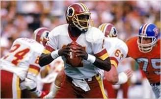 Washington Redskins QB Doug Williams was not only the first black quarterback to start a Super Bowl but he was named Super Bowl XXII MVP after a 340 yard, 4 touchdown effort.