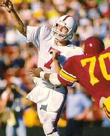 From his days as the quarterback for Stanford where he earned All-American honors and was the Pac-10 player of the year twice (1981 & 1982). Finished 2nd in Heisman balloting in 1982.
