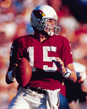 After a brilliant college career at Portland State he was chosen by the St. Louis Cardinals in the 2nd round of the 1981 draft. Played 8 years passing for 22771 yards and 136 touchdowns. Named to 2 Pro Bowls, in 1984 when he passed for 4614 yards and 28 touchdowns (second only to Dan Marino) and in 1987 when he led the NFL with 3387 yards.