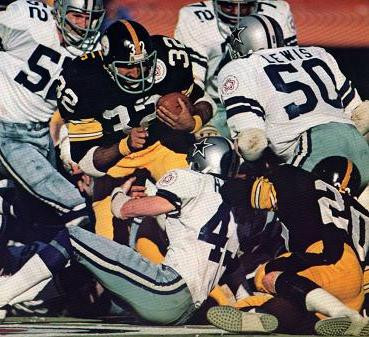 Super Bowl X of 1975. Several members of the "Doomsday Defense" of the Dallas Cowboys close in on Steelers fullback Franco Harris (#32). Pictured for the Cowboys are Dave Edwards (#52), Ed "Too Tall" Jones (#72), Cliff Harris (#43), DD Lewis (#50). Steelers halfback Rocky Blier (#20) is also pictured.