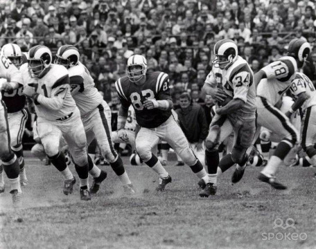 Pulling out to block for Rams runner Les Josephson as Colts linebacker Ted Hendricks (#83) is in hot pursuit.