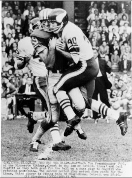 From the first Lions/Vikings game of 1963. The Lions won 28-10 and Cogdill had 3 catches for 50 yards and a touchdown. Also pictured is Vikings defender Tom Franckhauser who had an interception in the game.