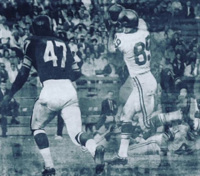 Making a catch against Carver Shannon and the Rams in 1963.