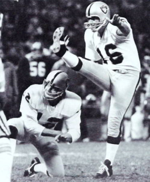 2 of Pro Footballs All-Time Greats. Kenny Stabler holds while the timeless George Blanda kicks the winning fieldgoal in the 1975 overtime win over Washington.