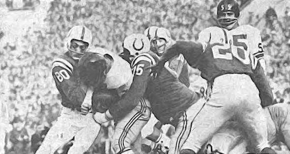 A poor Giants runner is gang tackled by by a trio of Colts defenders during the 1959 NFL Title game. The Colts would end the game with a 31-16 win and their second straight NFL Title. Colts pictured are Andy Nelson (#80), Gene Lipscomb (#76) and Milt Davis (#20). Ray Wietcha (#55) of the Giants stands in the background.  