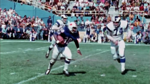 Noted for his incredible agility and speed as well as his strength, Olsen regularly tracked down ball carriers in the backfield for losses. Here he gets to Bills fullback Wayne Patrick on a pass in the flat before Patrick can make it back to the line of scrimmage.