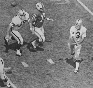 From 1967 action - Dan Archer (#78) keeps Bills tackle Ron McDole (#72) away long enough for Quarterback Daryle Lamonica to get the pass off. 