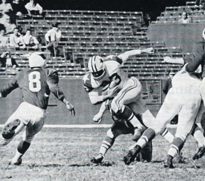 1960s NFL - St. Louis Cardinal Larry Wilson moves in to stop Gene Babb of the Cowboys