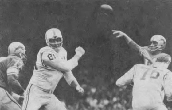 Lions QB Earl Morrall gets a pass away before Fred Miller and Ordell Braasse can get to him.