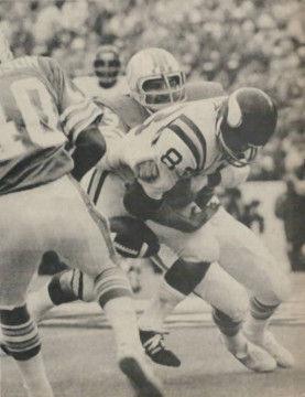 Dolphin All Pros Nick Buoniconti (#85) and Dick Anderson (#40) break up a pass intended for Viking tight end Stu Voigt (#83).