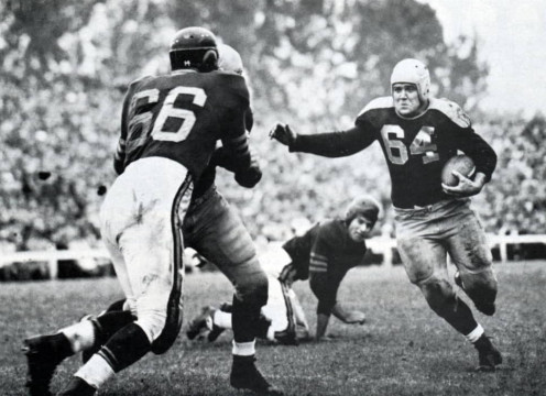 Packers Fullback Ted Fritsch carries against the Chicago Bears with Bulldog Turner moving up