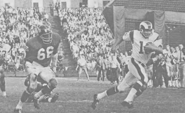 Ram QB Roman Gabriel breaks out past the Giants Henry Davis in this late 60s clash between the Rams and Giants. In 11 seasons with Los Angeles Gabriel had 1146 rushing yards and 28 rushing touchdowns.  