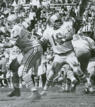 George Blanda left the NFL in 1958 and after joining the American Football League led Houston to 2 league championships in 1960 and 1961 and a 3rd straight appearance in 1962. Here he is in 1966, his last season in Houston before joining Oakland in 1967. #77 is tackle Rich Michael and #35 could very well be former NFL great John Henry Johnson. 