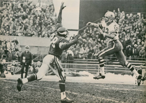 Roger Staubach, the 1971 NFL Bert Bell award winner gets the ball over the 1971 NFL MVP Alan Page. scoring 2 safeties, 3 fumble recoveries, blocking a punt and being credited with 109 tackles & 9 sacks Page was the first defensive player to ever earn that title. While Staubach was led the Cowboys to 10 victories while throwing but 4 interceptions in 126 attempts. That was a league leading interception percentage of 1.9%. 