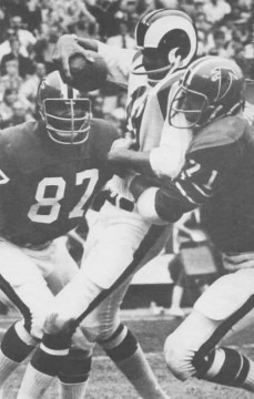 Early 1970s Rams-Falcons. Atlanta lineman John Zook and Claude Humphrey close in and bring down Rams quarterback Roman Gabriel.