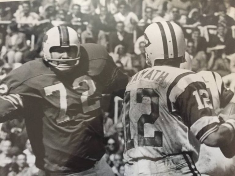 Joe Namath under pressure from Ron McDole