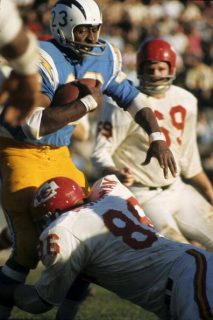 The Chiefs Buck Buchanan Tackles Paul Lowe of the Chargers