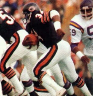 Chicago Bears Runner Walter Payton carries against Minnesota