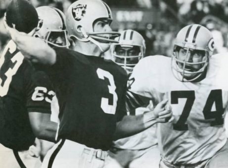Daryle Lamonica under pressure from Henry Jordan of the Packers