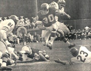 Bill Brown of the Vikings and Ed O' Bradovich, Doug Atkins & Dave Whitsell of the Bears in 1966 NFL