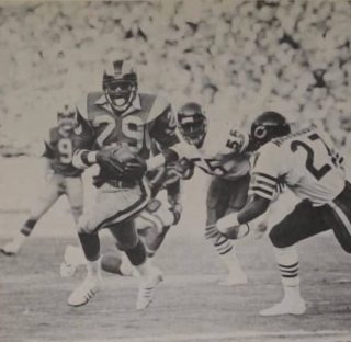 Rams Hall of Famer Eric Dickerson carries the ball against Mike Richardson & Otis Wilson of the Bears