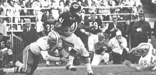 Chuck Howley and Brian Piccolo collide