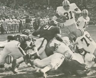 Dick Butkus in a goal line stand against Jim Taylor and the green Bay Packers