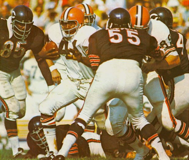 The Browns Leroy Kelly carries against the Chicago Bears defense in 1969