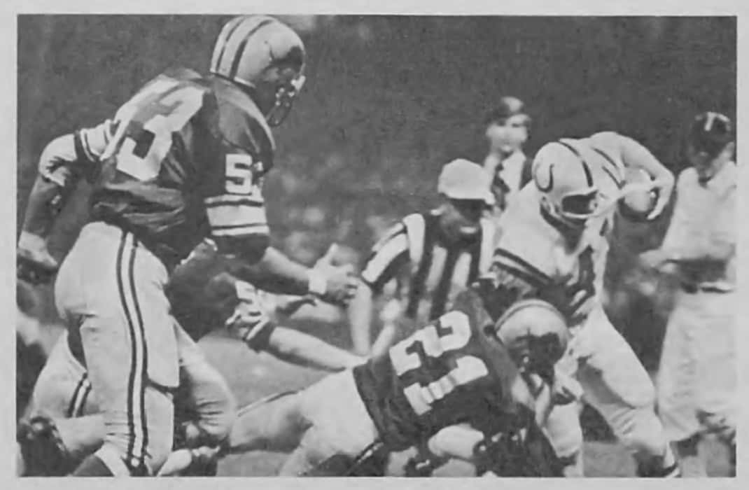 Tom Matte carries against the Detroit Lions Mike Lucci & Bruce Maher in 1966 NFL
