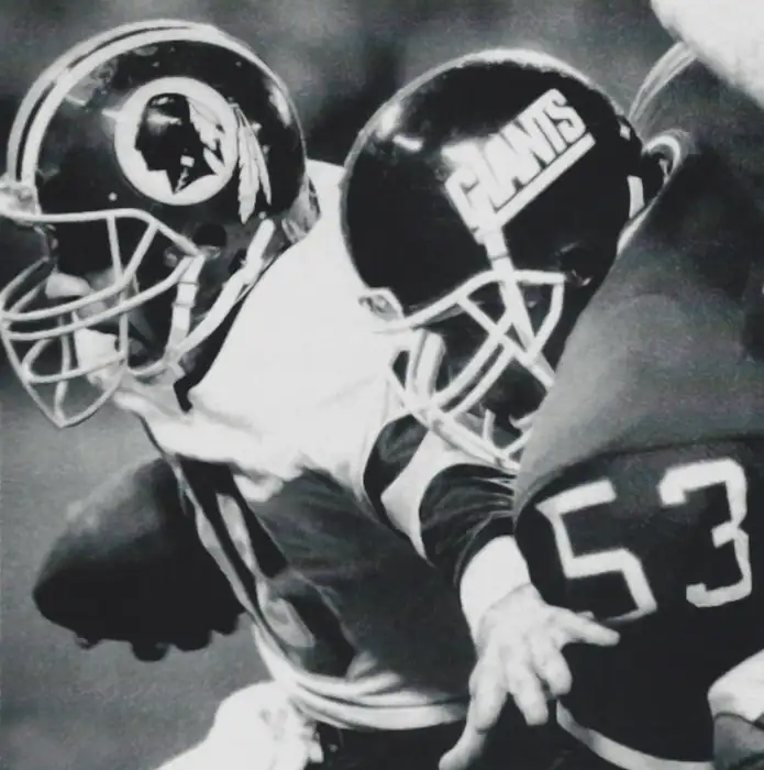 Harry Carson stops Jay Schroeder