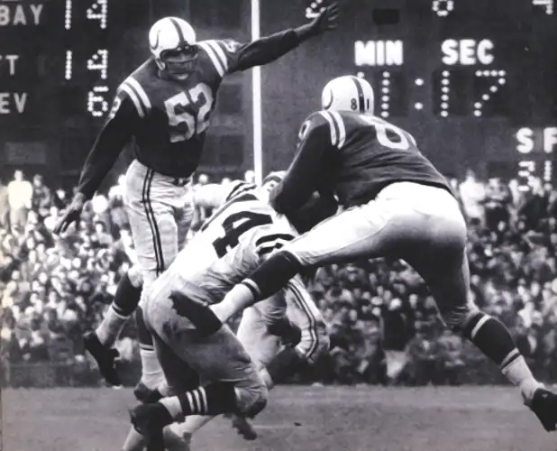 Dick Szymanski & Ordell Braase take down YA Tittle in 1960 - Colts/49ers