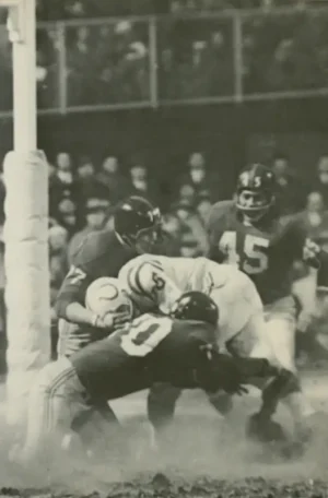 Picture of Giants Sam Huff, Dick Modzelewski and Emlen Tunnell Stopping a Colts Runner