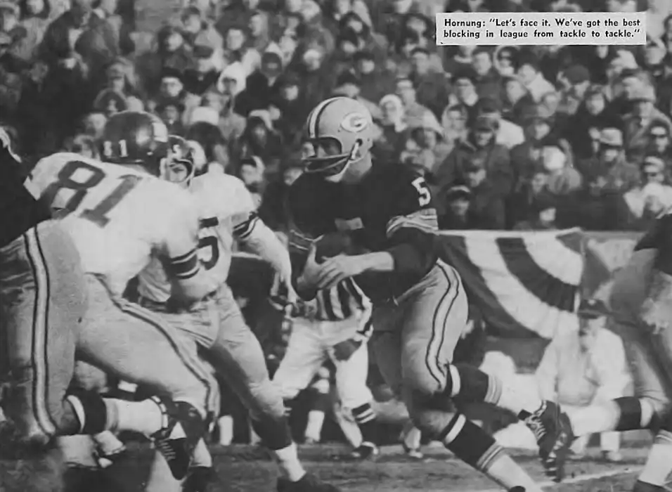Packers great Paul Hornung shows a little appreciation for his Offensive Line in a 1962 Sports Mag article. That's Giants Hall of Famer Andy Robustelli in the foreground.