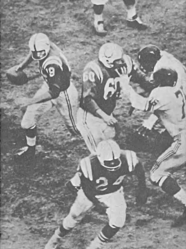 Classic 1959 Baltimore Colts vs New York Giants. Johnny Unitas led the Colts to a 31-16 win over the Giants in the NFL Title Game that year. Unitas was named league MVP completing 193 of 367 passes for 2899 yards and 32 touchdown passes. Other Colts here are lineman George Preas and Lenny Moore.
