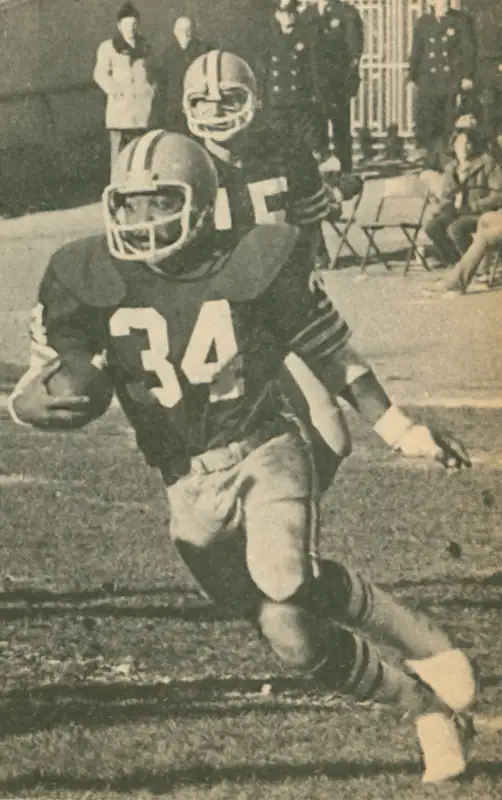 Greg Pruitt had some nice numbers in 1975 - 1067 Rushing Yards, 299 Receiving Yards and 432 Return Yards for a grand total of 1798 All-Purpose Yards. Had 10 Total Touchdowns too. That looks like quarterback Mike Phipps in the background.