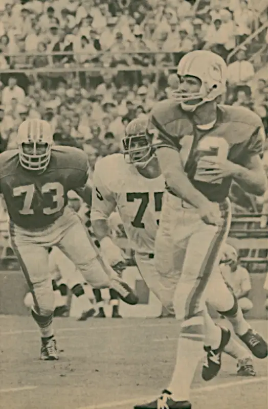 Rookie Bob Griese and Norm Evans of the Dolphins with the Chiefs Jerry Mays - 1967 AFL Football