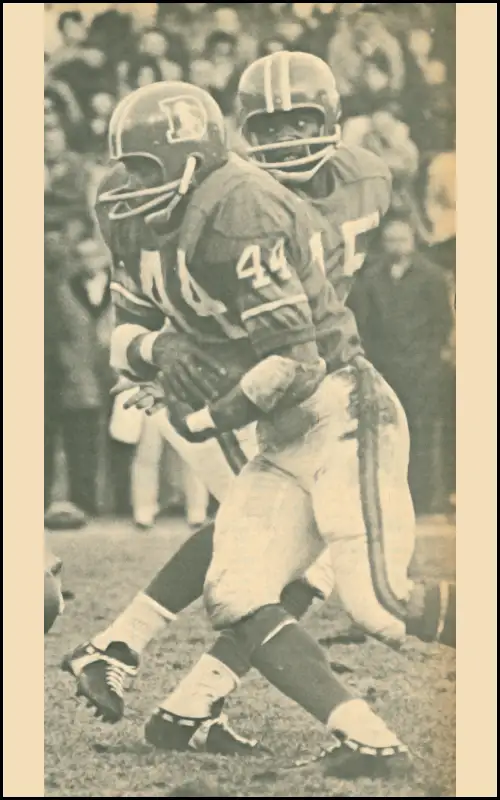 Bronco runner Floyd Little takes a handoff from rookie quarterback Marlin Briscoe in 1968. Floyd Little was the team's top rusher with 584 yards while Briscoe, a 14th round pick from Omaha University started 5 games, winning 2 (the Broncos only won 5 games that season). By 1969 he would be in Buffalo as wide receiver. A position he would star at for 8 seasons.