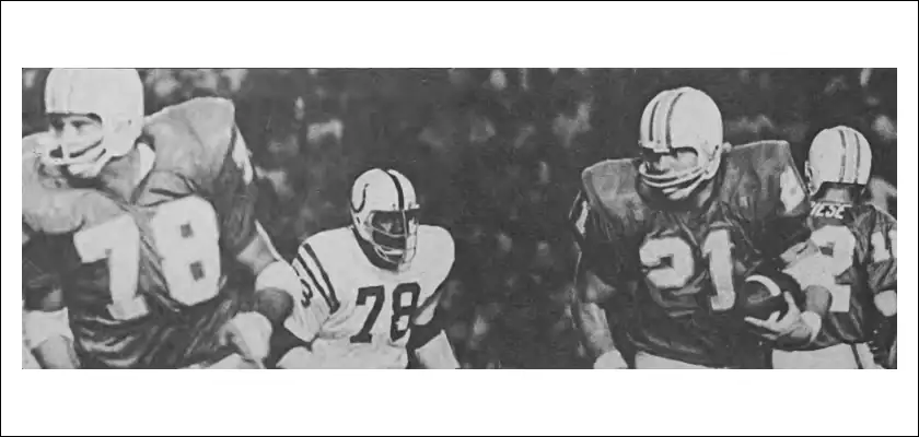 Back-up tackle Wayne Mass gets in front of Dolphins runner Jim Kiick in this early 1970s action. That looks like Big Bubba Smith lurking in the background.