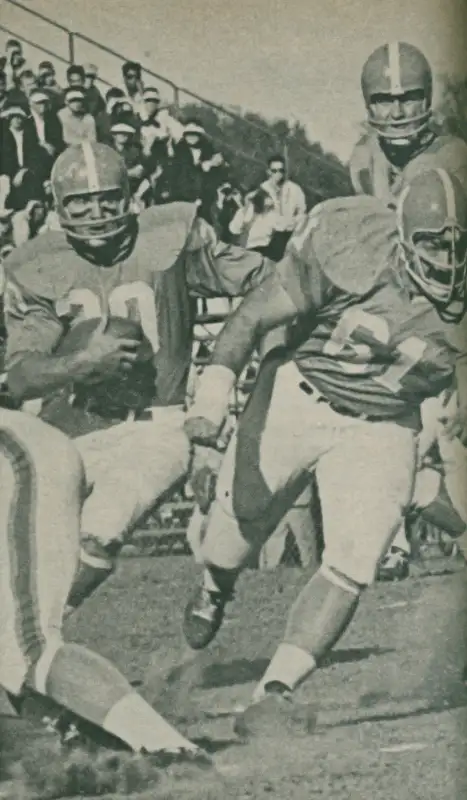 Some Houston Oilers action from the early 1960's AFL era. Billy Cannon gets behind All League Guard Bob Talamini. Talamini played 9 seasons in the AFL, winning 2 AFL Championships in Houston and 1 in New York. Drafted by Houston in 1960, Cannon remained active throughout the entirety of the AFL plus 1 year in the NFL. He made All AFL twice and AFL All Star twice.