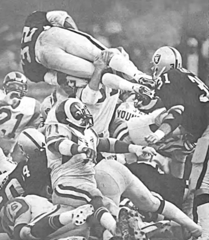Marcus Allen over the top against the Rams Defense - 1980s NFL Football