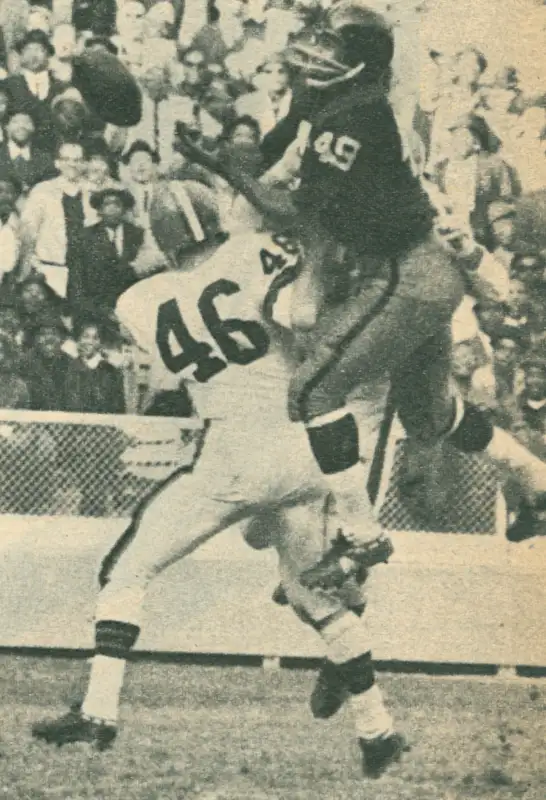 Redskin Bobby Mitchell Makes a Catch Against Don Fleming of the Browns in 1962.
