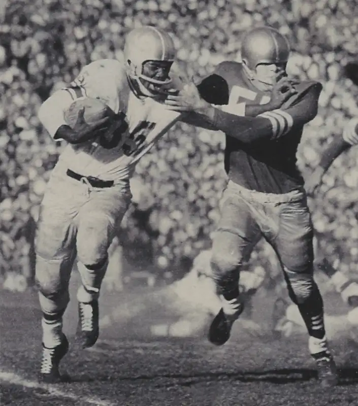 Old School NFL action - Detroit Lions runner John Henry Johnson works to elude a defender