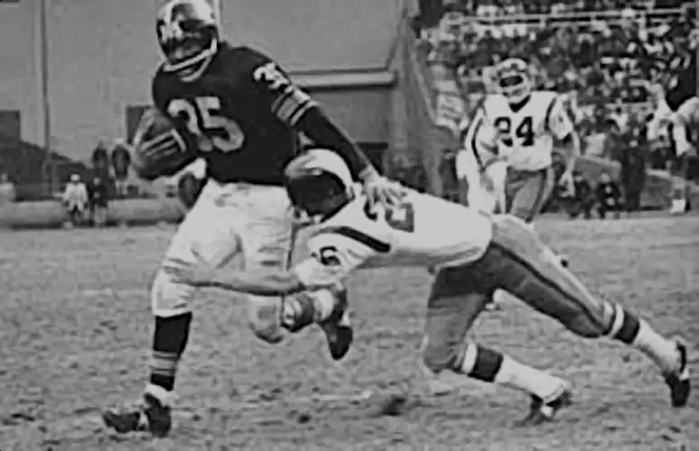 Redskin Paul Krause makes an attempt to stop Steelers fullback John Henry Johnson