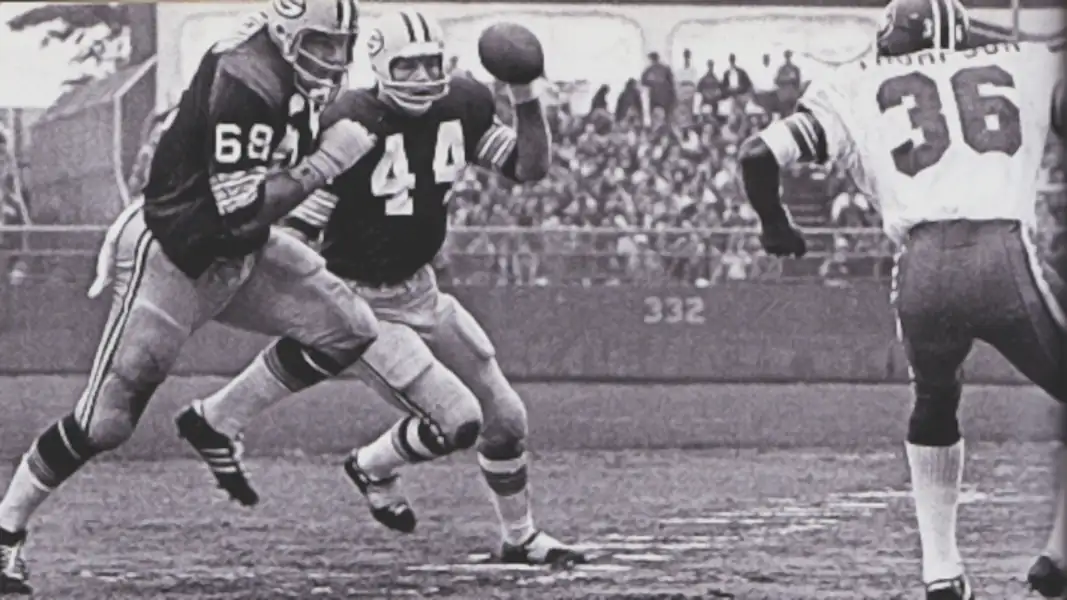 Gale Gillingham getting out in front of Donny Anderson to take on Bronco Bill Thompson. Gillingham, a 5-time Pro Bowler played 10 seasons in Green Bay. Bill Thompson played 13 in Denver and had 3 Pro Bowls himself.
