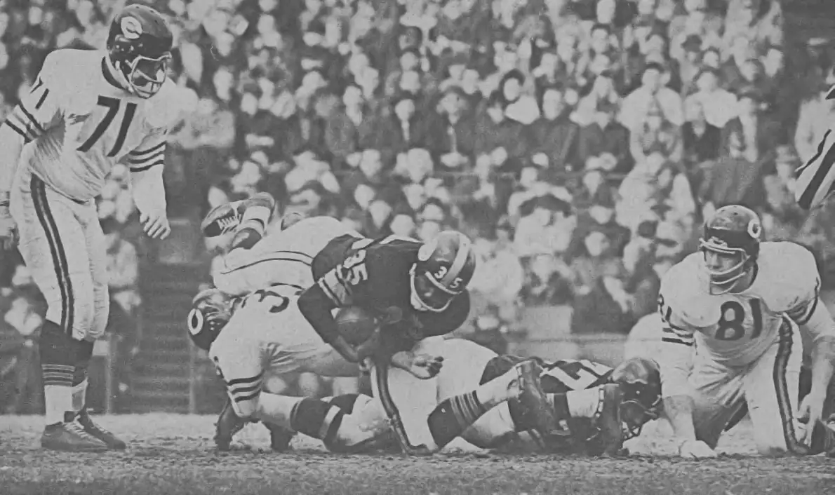 John Henry Johnson Stopped By Larry Morris, Earl Leggett and Doug Atkins of the Chicago Bears Defense in the 1963