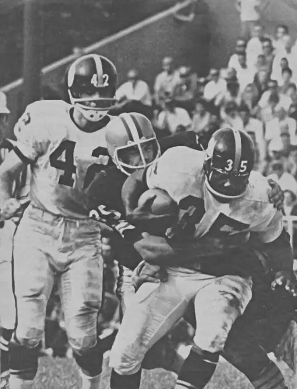 Galen Fiss Wraps Up Steeler John Henry Johnson in 1963
