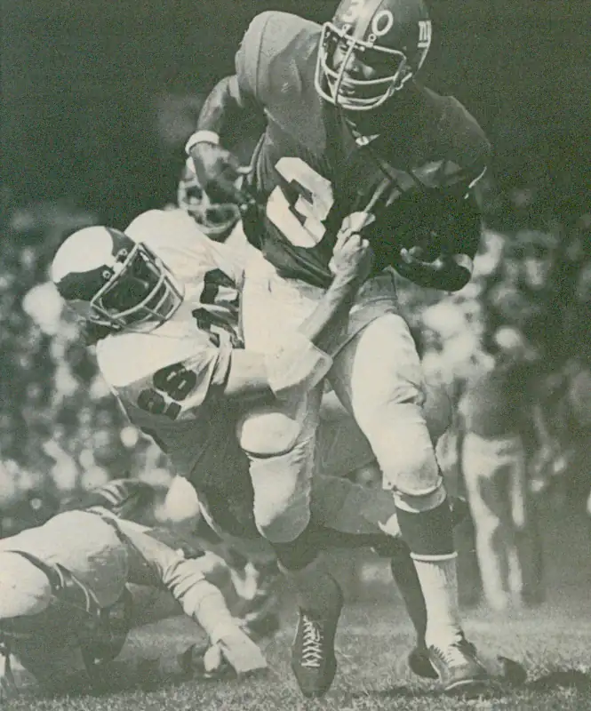 The Giants 1973 NFL season amounted to just 2 wins. Running Back Ron Johnson's 292 Touches and 1279 Total Yards accounted for almost a third of the Giant's Total offense that year. His 9 touchdowns equaled almost a quarter of the Total Scoring. Here he is against the Eagles with a determined Bill Bradley clinging on tight.