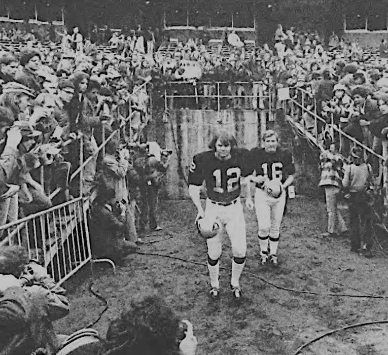 Raider icons Kenny Stabler and George Blanda emerge onto a muddy field before a game, sometime in the mid-1970s. Blanda was well into 40s by the time Kenny Stabler, a 2nd-round pick from Alabama, joined the team. The two remained team mates until 1975. Stabler was 30 years of age, Blanda 48.