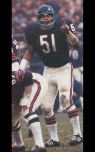 Chicago Bears Middle Linebacker Dick Butkus give defensive orders
